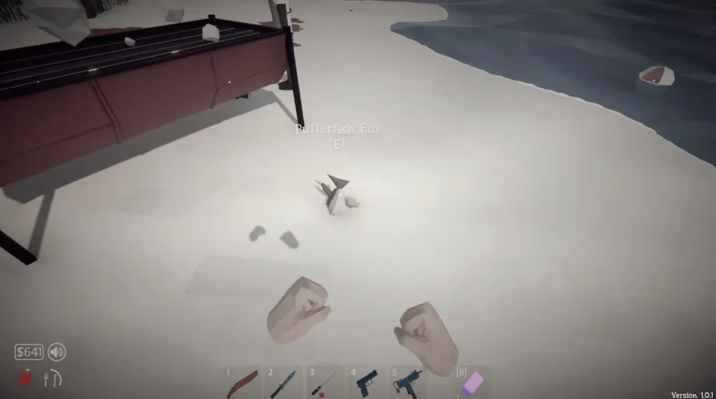 The Pufferfish Fin quest item lying on the beach in How to Fish with its pickup prompt visible